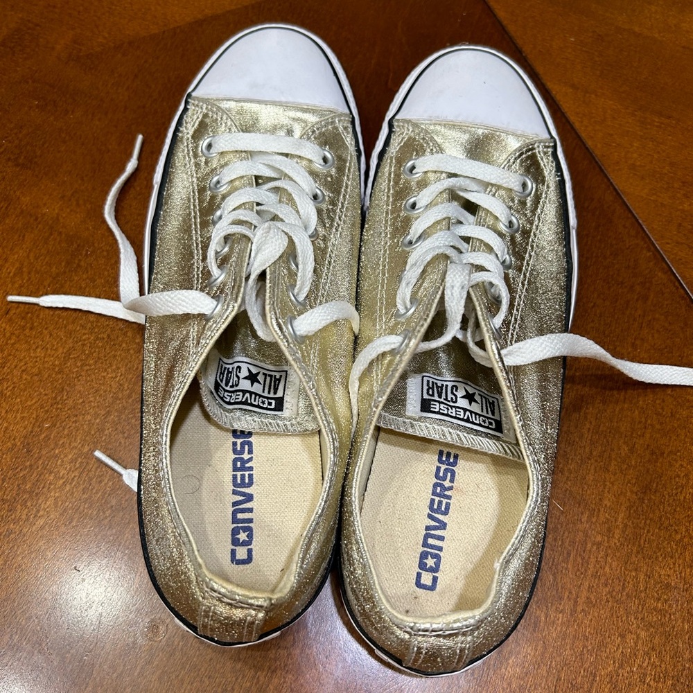 Gold Converse sneakers